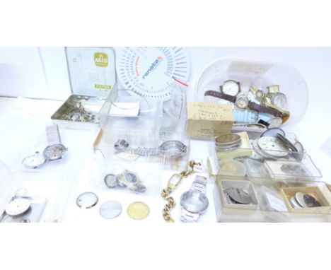 A large collection of wristwatch and pocket watch parts, dials, movements, etc., including Mido, Longines, Certina, Roamer, S