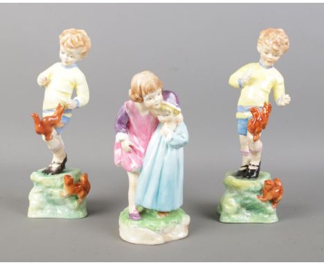 Three Royal Worcester ceramic figures; October (2) and 'Babes in the Wood' (3302).