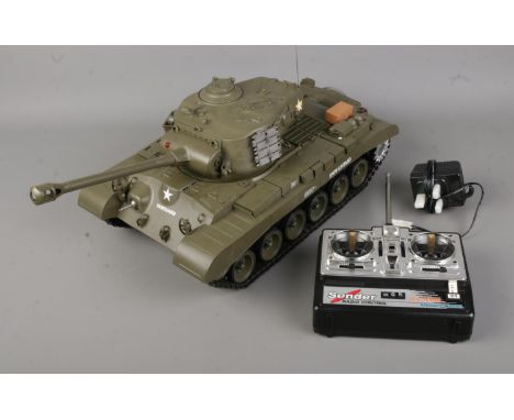 A 1/16 scale RC battle tank: Vanguard Snow Leopard featuring BB pellets. Includes Sender Radio Control and power cord.  Light