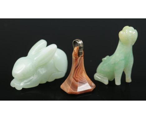 A hardstone seal fob along with two jade coloured animals, rabbit and dog.  No signs of damage.