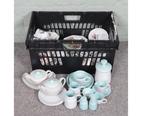 A box collection of vintage Poole pale blue tea sets and Johnson Brothers "Cloverleaf" table pottery.