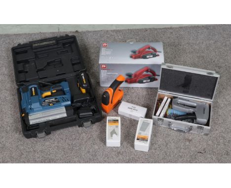 A collection of assorted tools to include Workzone brad nailer/staple gun, Power Performance planer, Stanley, etc.