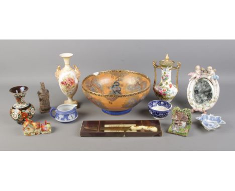 A box of assorted ceramics. To include Royal Worcester blushware twin handled vase, Copelands China urn, large CarltonWare bo