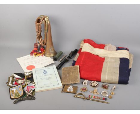 Military collections including a copper &amp; brass military signal Bugle with cords and coat of arms of the University of We