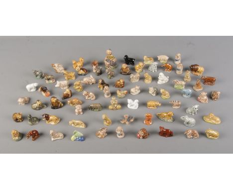 A good collection of Wade Whimsie ceramic figures to include Little Bo Peep, Horses, Dogs, Monkeys, etc.