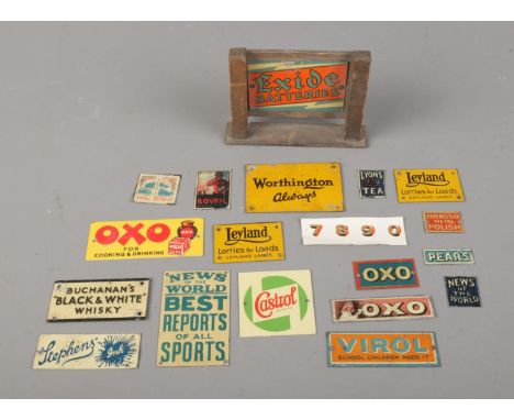 A collection of Bassett-Lowke tin plate miniature model advertising signs to include Exide Batteries on wooden sign, Leyland,