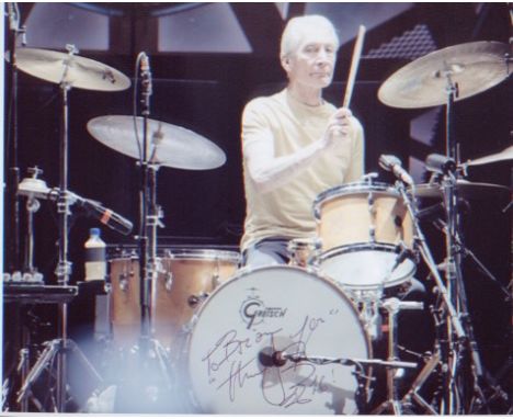 Rolling Stones Charlie Watts signed 10 x 8 inch picture from playing drums. Excellent. 