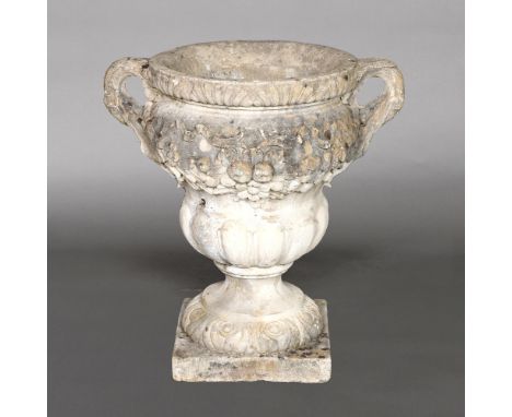 A CLASSICAL STYLE URN PLANTER. with scrolling foliate decoration and loop mask handles, height 75cm, width 48cm Location: - B