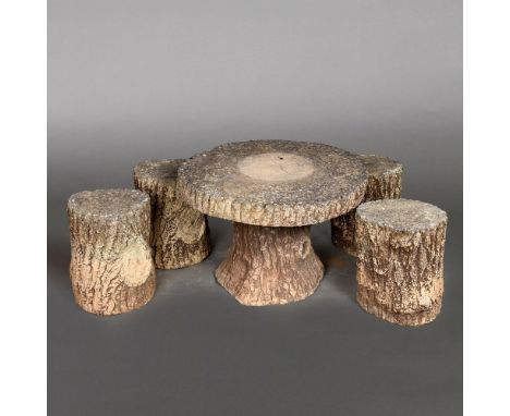 A FAUX BOIS TABLE AND STOOL SET. comprising a circular table and four trunk effect stools, table height 51cm, width 76cm, sto