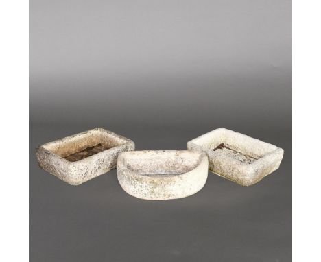 A PAIR OF SHALLOW STONE TROUGH PLANTERS. 59cm x 43cm, together with a curved planter (3) Location: - Berkshire RG41