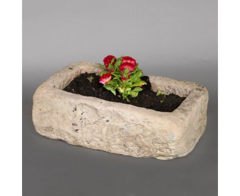 A CARVED YORK STONE TROUGH PLANTER. height 23cm, width 60cm x depth 36cm Location: - Berkshire RG41