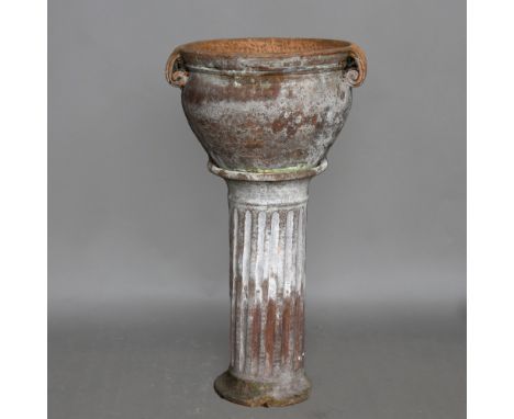 A TERRACOTTA PLANTER ON PEDESTAL. total height 74cm, diameter of pot 36cm Location: - Hertfordshire (AL4)