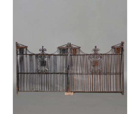 A PAIR OF 19TH CENTURY WROUGHT IRON ENTRANCE GATES. with plaques for McIlroy Ltd, York St, Belfast foundry on each, total wid