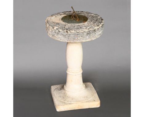 A WILLOWSTONE SUNDIAL. on a turned column, height 65cm, width 41cm Location: - Berkshire RG41