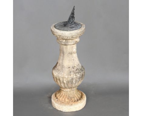 A STONE SUNDIAL. on a lobed column, height 75cm Location: - Berkshire RG41