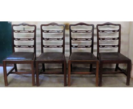 Set of four 19th century mahogany piercework decorated ladder back dining chairs. App. 97cm H x 49cm W x 42cm D All in reason