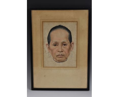 Chinese School (mid-19th century, Qing dynasty)An Ancestor Portrait of an Elderly Woman, head-length, staring face-on from et