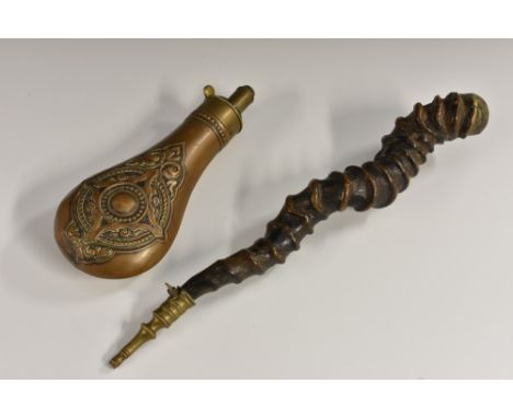 A 19th century copper and brass shot flask, embossed with strapwork, 20cm long; a horn powder flask, 31cm long (2)