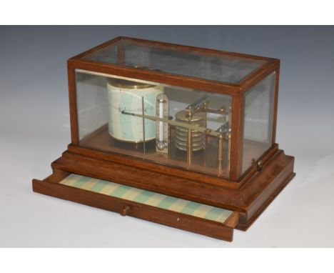 An early 20th century oak barograph, by Negretti &amp; Zambra, London, mercury thermometer, bevelled glass cover, chart drawe
