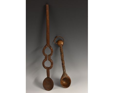 Treen - a rustic spoon or ladle, dug-out bowl, carved stem, 27cm long; a tribal hardwood spoon, 46.5cm long (2) 