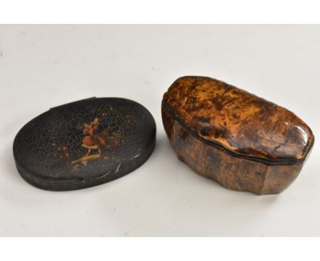 An 18th century lacquerred burr commode shaped snuff box, hinged cover with mirror to verso, 9cm wide, c.1750; a japanned bra