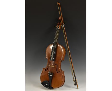 A violin, the two-piece back 36cm long excluding button, outlined throughout with purfling, 60cm long overall, cased, the bow