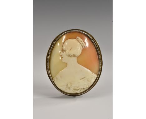 A 19th century shell cameo brooch, carved with the portrait of a young lady of title, bust length, facing to dexter, 5.5cm x 