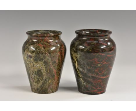 A pair of 19th century Cornish serpentine baluster mantel vases, turned rims, green and red inclusions, geological fissures, 
