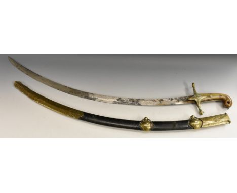 A 19th century Mameluke type sword, of shamshir form, 82cm curved blade engraved with trophies, brass cross-guard, two-piece 