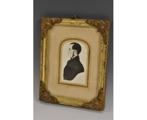 English School, a miniature, of a 19th century gentleman, bust length in profile, lithograph, arched mount, 8.5cm x 5.5cm