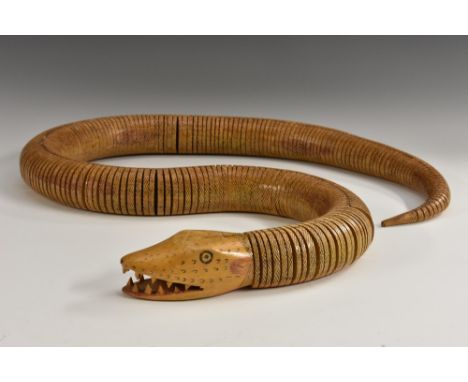 A large Indian articulated model of a snake, penwork scales and features, 144cm long