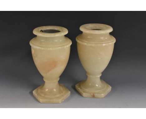 A pair of 19th century alabaster mantel urns, hexagonal bases, zinc liners, 19cm high, c.1880