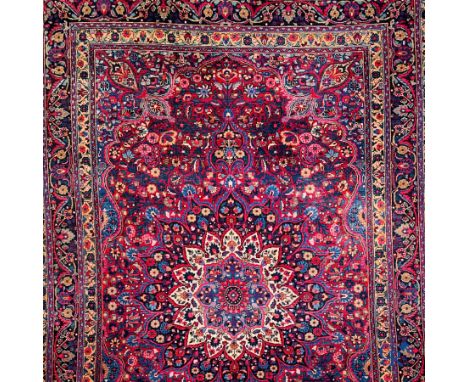 Oriental carpets: Iran, antique Persian carpet with dark red background. | 202 x 133 cm. | Condition: signs of use.