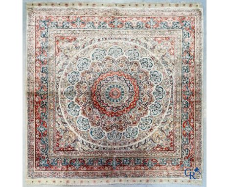 Oriental carpets: Hereke, a finely knotted silk Oriental carpet with floral decor. | 140 x 140 cm.