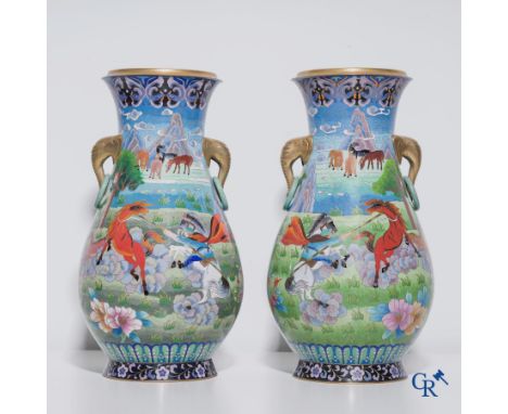 A pair of vases in Chinese cloisonné enamel with a decor of horses, circa 1980. | Height: 46 cm.Diameter: 25 cm.