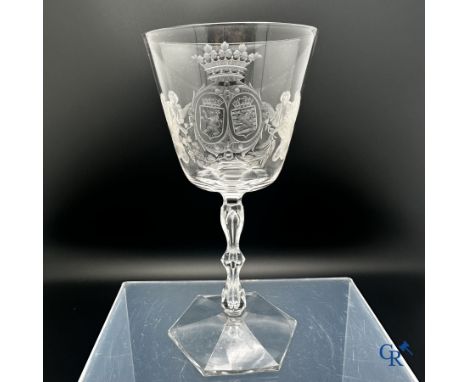 Val Saint Lambert: Exceptional wine glass in white crystal decorated with 2 crowned coats of arms held up by angels. 19th cen