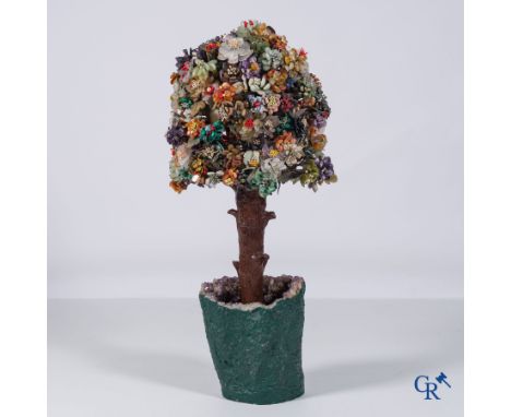 A decorative amethyst vase with a tree in various rocks. Jade, lapis lazuli, rock crystal, etc. Circa 1960-1970. | 110 x 45 x