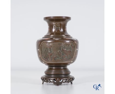 Asian Art: A Chinese copper and silver inlaid bronze vase with embossed decor for the Vietnamese market. 19th century. | Heig