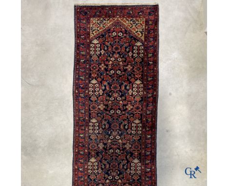 Oriental carpets: Antique hand-knotted Oriental carpet. | 352 x 104 cm. | Condition: Traces of use.