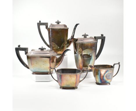 An early 20th century Mappin &amp; Webb silver plated tea service. The five piece Art Deco service comprising of a tea pot, c