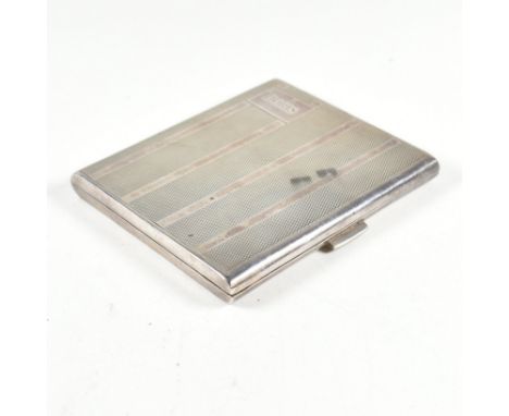 A George V hallmarked silver cigarette case. The early 20th century case having an engine turn design with vertical stripe pa