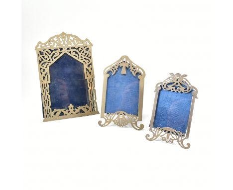 A collection of three Egyptian silver fronted picture frames. The picture or photo frames each having a pierced window design