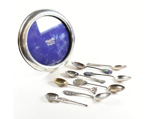 An Edward VI hallmarked silver picture frame (AF) and other spoons.&nbsp;The lot to include an Edward VII frame. The frame of