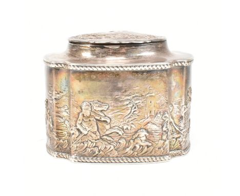 A late Victorian hallmarked silver tea caddy. The tea caddy having a repoussé pattern depicting cherubs within a landscape sc