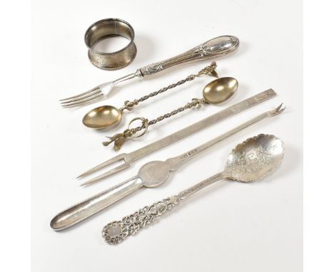 A collection of Victorian and later hallmarked silver flatware items. The lot to include a&nbsp;George V lobster pick of trad