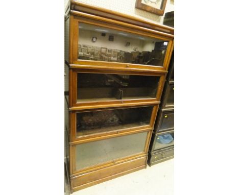 A 19th Century mahogany Globe-Wernicke bookcase of four sections, one section bearing label "The Globe-Wernicke Co Ltd, Offic