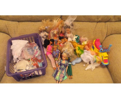 A basket containing various Barbie and other dolls, an LFC Rubik's Cube Collector's Edition, LFC 3D Replica Stadium (boxed), 