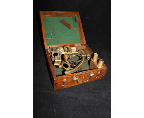 A 19th Century brass sextant inscribed "D McGregor 7 Co, Glasgow, Greenock, London and Liverpool" housed in a fitted case bea