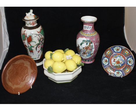 A Chinese baluster shaped crackle ware vase and cover decorated with warriors bearing four character seal mark to base, a mod