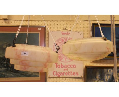 A pair of Art Deco glass ceiling light shades, one with a pink marbled finish, the other with a pink and green marble finish